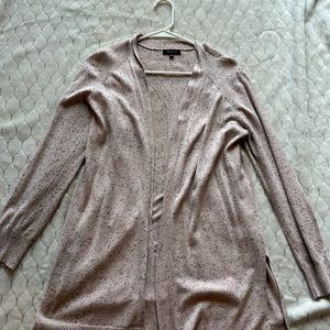 Pink with black dot cardigan. Slits on the side